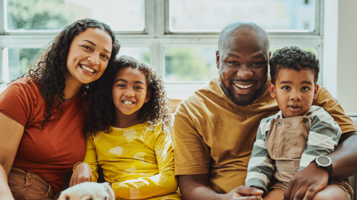 happy family sitting down